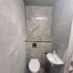 Kamenné obklady koupelny a záchodu